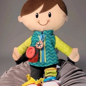 Playskool Smiling Stuffed Activity Doll with Green and Blue Outfit